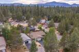Discover this charming neighborhood nestled amongst towering pine trees, offering a serene and private atmosphere.