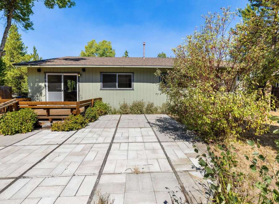 Enjoy outdoor living with this spacious patio area, perfect for entertaining or relaxing.