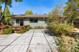 Enjoy outdoor living with this spacious patio area, perfect for entertaining or relaxing.