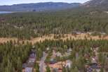 Discover this charming neighborhood nestled amidst a dense forest, offering a serene and private living experience.