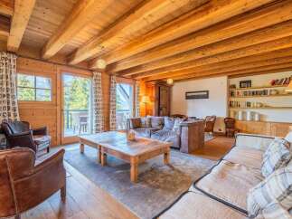 Experience rustic charm and modern comfort in this beautifully appointed living room.