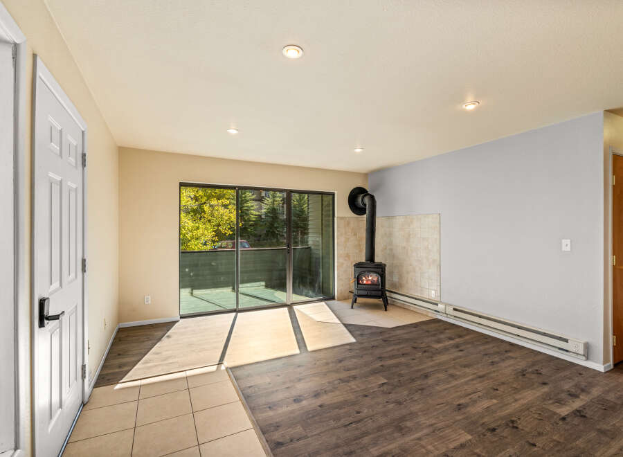 Cozy living space featuring a charming wood-burning stove, perfect for chilly evenings.