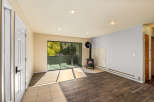 Cozy living space featuring a charming wood-burning stove, perfect for chilly evenings.