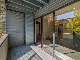 Enjoy the outdoors from this spacious balcony, perfect for relaxing or entertaining.