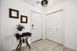 Step into this welcoming entryway featuring a smart lock on the front door for enhanced security.