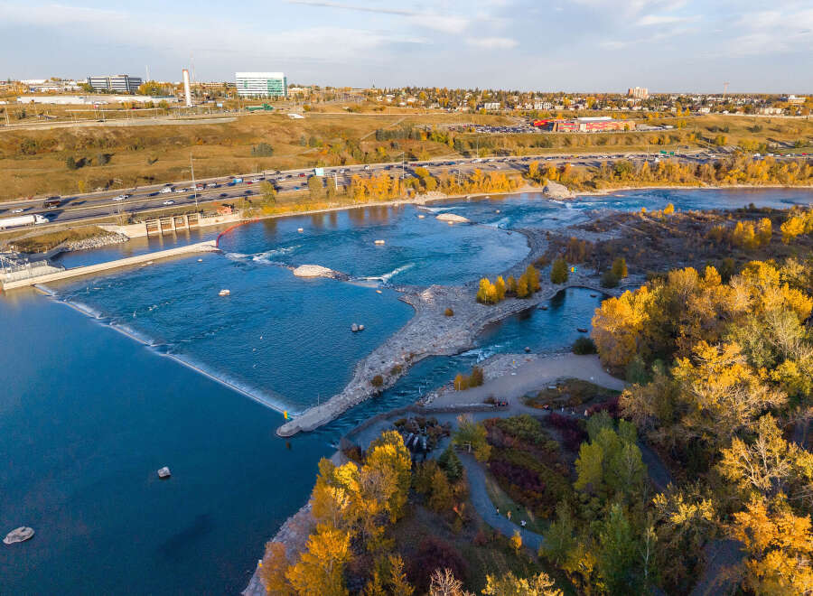 Experience the vibrant autumn colors surrounding this stunning waterfront property.