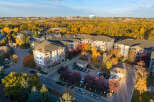 Experience modern living in this stunning apartment complex, nestled amidst vibrant autumn foliage.