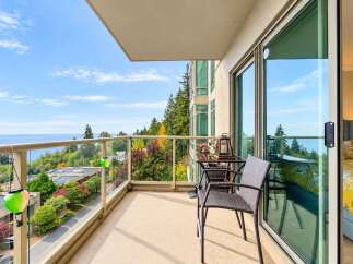 Enjoy breathtaking ocean and forest views from this stunning balcony, perfect for morning coffee or evening relaxation.