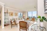 Experience breathtaking ocean and forest views from this stunning living room.