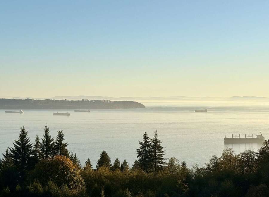 Experience breathtaking panoramic views of the ocean and distant mountains from this stunning property.