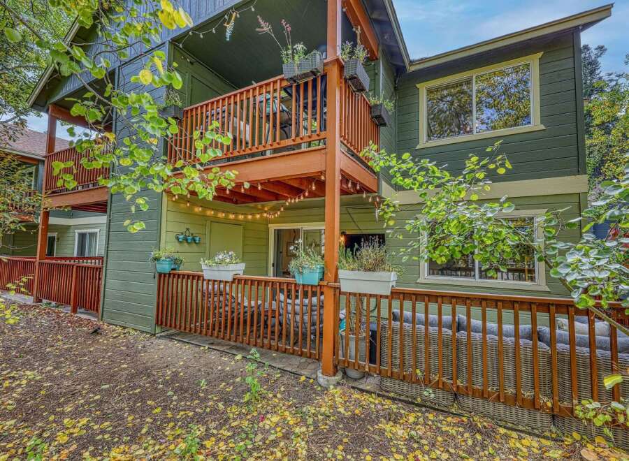 Enjoy outdoor living on the multi-level decks of this charming home, perfect for entertaining or relaxing.