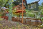 Enjoy outdoor living on the multi-level decks of this charming home, perfect for entertaining or relaxing.