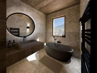 Experience luxury in this modern bathroom, featuring a sleek, freestanding bathtub and a minimalist rectangular sink.