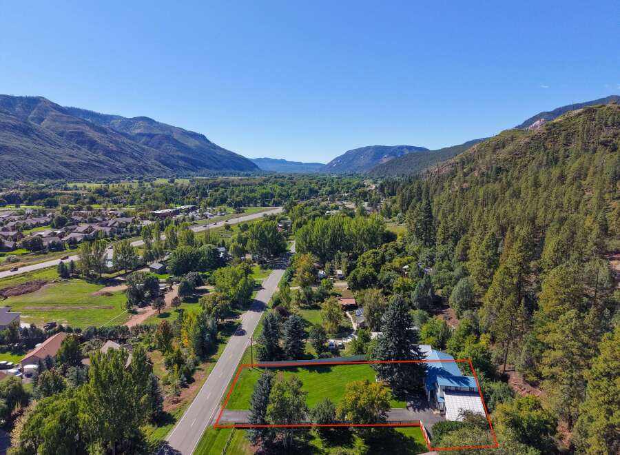 Discover this stunning property nestled in a picturesque valley, offering breathtaking mountain views and a serene natural setting.