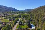 Discover this stunning property nestled in a picturesque valley, offering breathtaking mountain views and a serene natural setting.