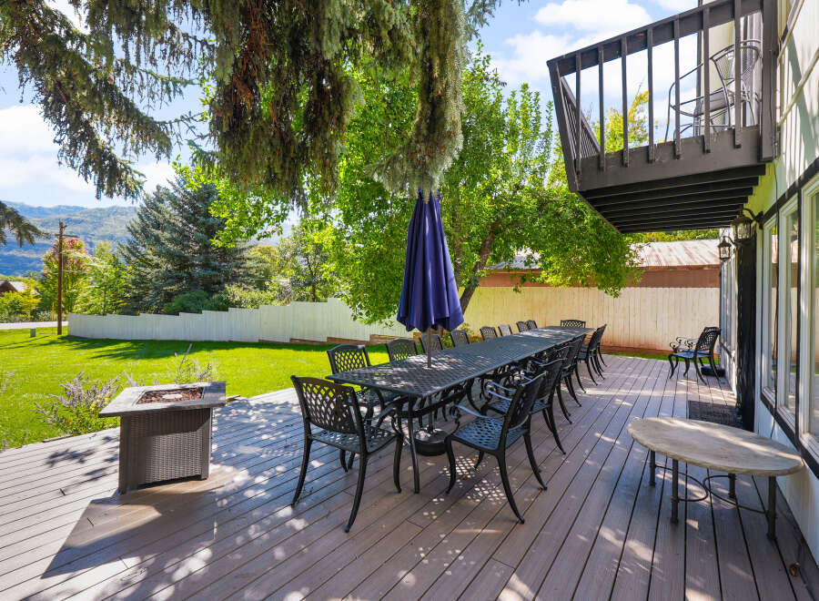 Enjoy outdoor living at its finest on this expansive deck, perfect for entertaining.