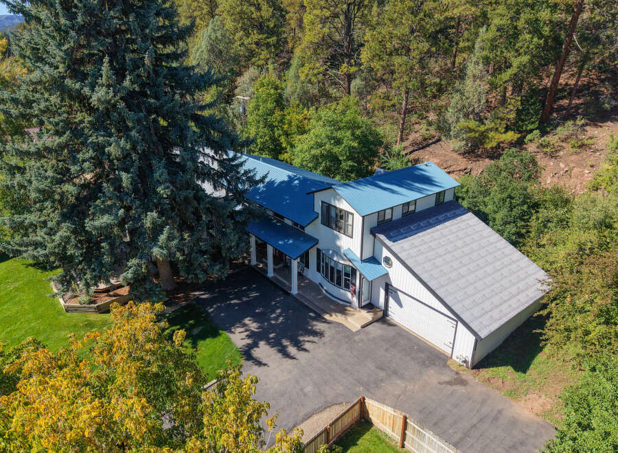 Experience the charm of this stunning property nestled amidst lush greenery and mature trees.
