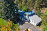 Experience the charm of this stunning property nestled amidst lush greenery and mature trees.