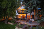 Enjoy evenings on the expansive deck of this charming home, perfect for entertaining guests or relaxing with family.