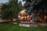 Enjoy evenings on the expansive deck of this beautiful home, perfect for entertaining guests.