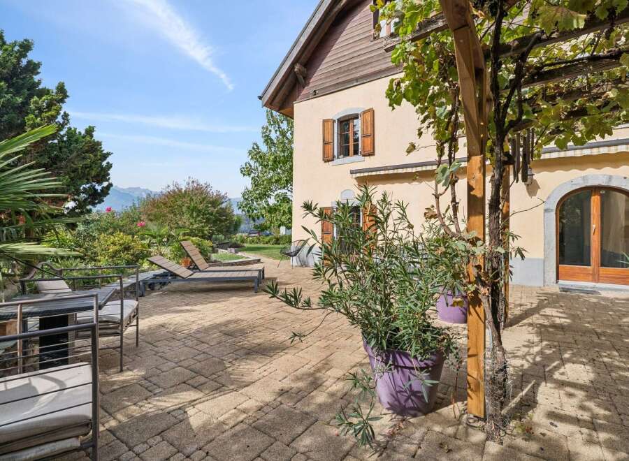 Enjoy outdoor living on this charming patio, perfect for relaxing or entertaining.