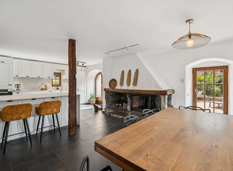 Experience the perfect blend of rustic charm and modern convenience in this open-concept living space.