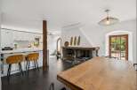 Experience the perfect blend of rustic charm and modern convenience in this open-concept living space.