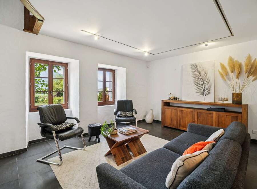 Experience rustic charm and modern comfort in this inviting living room.