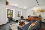 Experience rustic charm and modern comfort in this inviting living room.