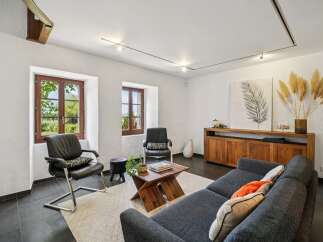 Experience rustic charm and modern comfort in this inviting living room.