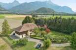 Nestled amidst rolling hills and majestic mountains, this charming property offers a serene escape.
