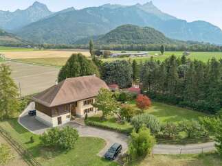 Nestled amidst rolling hills and majestic mountains, this charming property offers a serene escape.