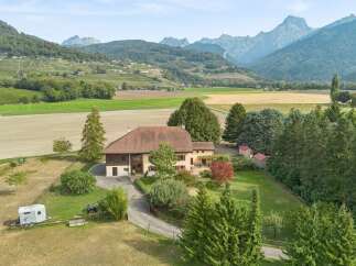 Discover this charming property nestled amidst picturesque rolling hills and majestic mountains.