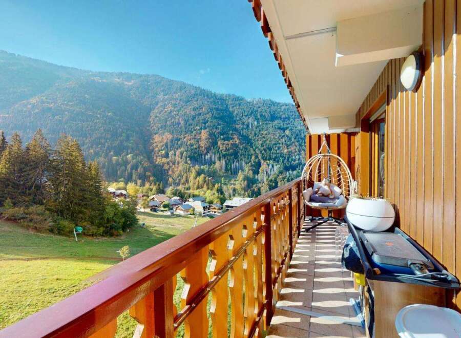 Enjoy breathtaking mountain views from this charming balcony, perfect for your morning coffee or evening relaxation.
