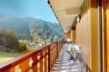 Enjoy breathtaking mountain views from this charming balcony, perfect for morning coffee or evening relaxation.