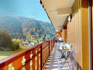 Enjoy breathtaking mountain views from this charming balcony, perfect for morning coffee or evening relaxation.