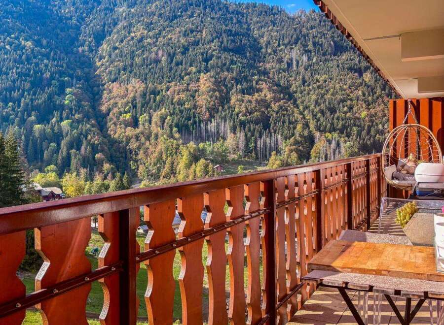 Enjoy breathtaking mountain views from this charming balcony, perfect for your morning coffee or evening relaxation.