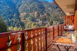 Enjoy breathtaking mountain views from this charming balcony, perfect for your morning coffee or evening relaxation.