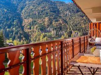 Enjoy breathtaking mountain views from this charming balcony, perfect for your morning coffee or evening relaxation.