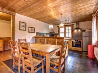 Experience rustic charm in this inviting dining area and kitchen.