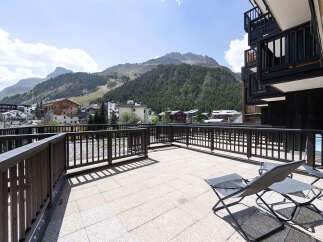 Enjoy breathtaking mountain views from this spacious balcony, perfect for relaxing and entertaining.