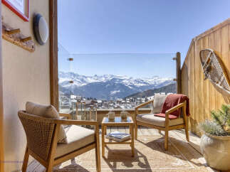 Experience breathtaking mountain views from this charming balcony, perfect for enjoying your morning coffee or evening relaxation.