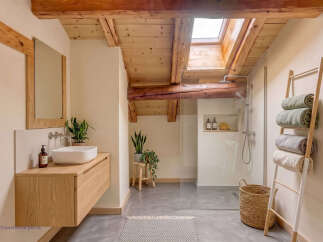 Experience rustic charm and modern convenience in this beautifully designed bathroom.
