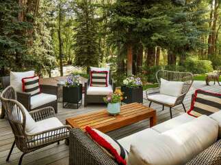 Experience the ultimate in outdoor living with this stunning deck, perfect for entertaining or relaxing amidst nature.