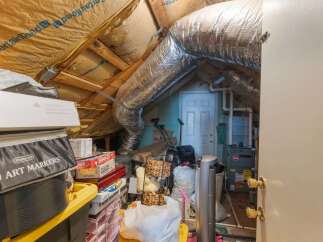 Discover the potential of this attic space, perfect for storage or conversion.