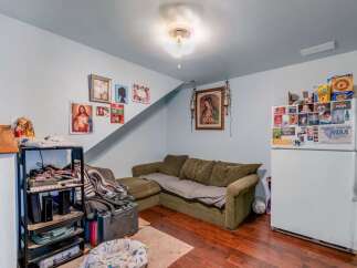 This cozy living space features a comfortable sectional sofa perfect for relaxing or entertaining.