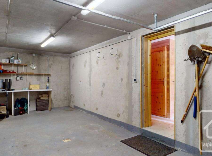 This property features a spacious and functional garage, perfect for storing vehicles and outdoor equipment.