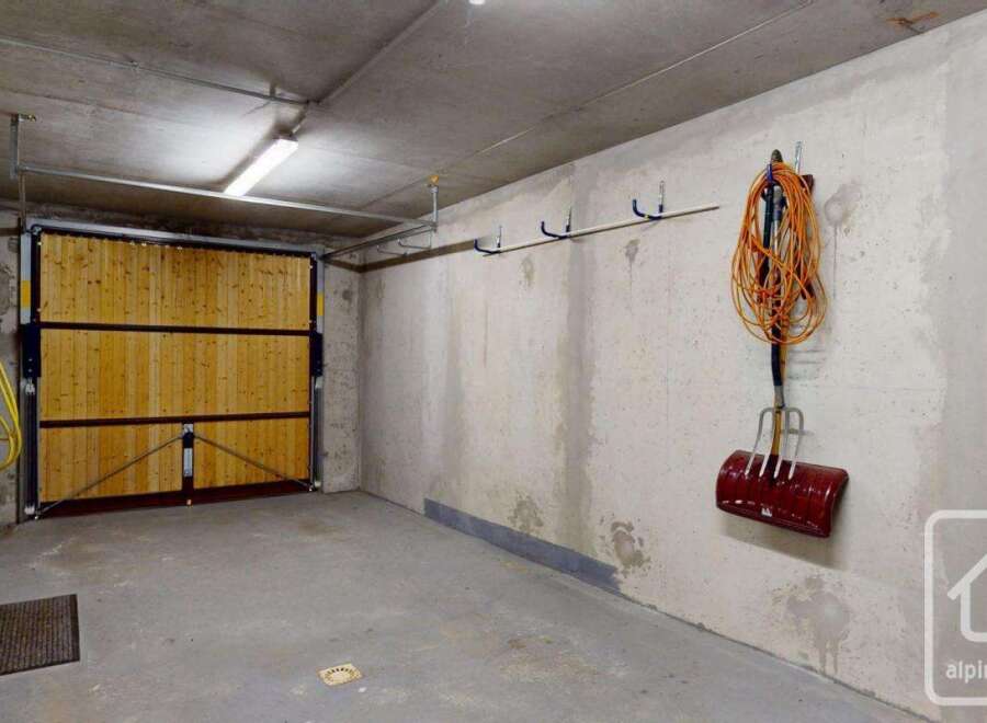 This spacious garage offers ample storage and convenience for your vehicles and outdoor equipment.