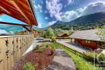 Experience the charm of alpine living in this picturesque property nestled amidst breathtaking mountain scenery.