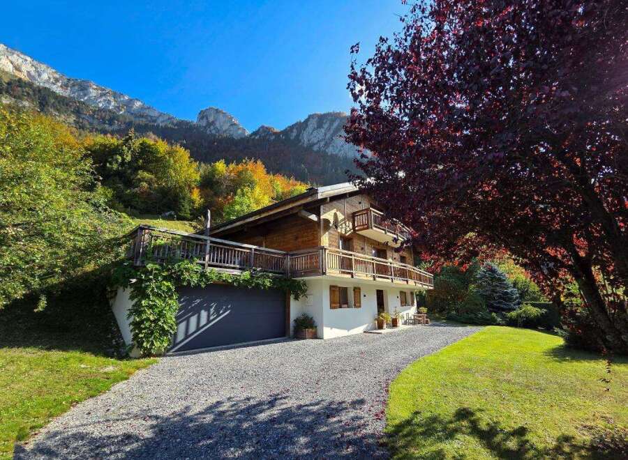 Nestled against a stunning mountain backdrop, this charming chalet offers the perfect blend of rustic elegance and modern comfort.